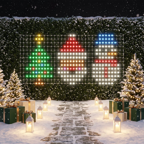 Cheriemood XL Net Lights on a snowy garden hedge at night, showing a Christmas tree, Santa and a snowman side by side in LED dots